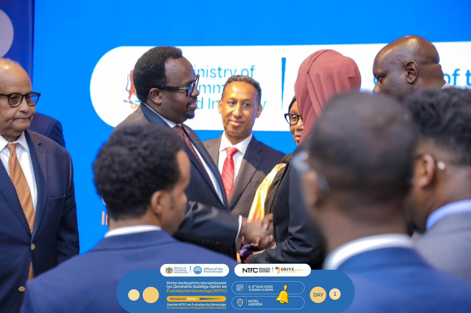 Government and business delegates pose together at the workshop